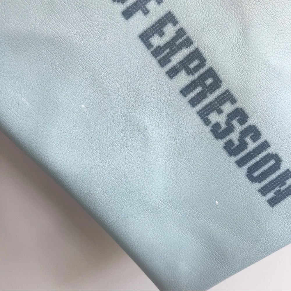Rebecca Minkoff X Stitch Fix Freedom of Expression light blue vegan pouch bag